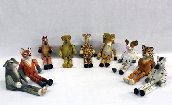 9 Bass Wood Carved & jointed Shelf Critters: 9 Bass Wood Carved & jointed Shelf Critters. Collection includes a horse, bighorn, rabbit, fox, cow, dog, zebra, giraffe, and tiger. Unique and painted these measure approx. 7.5''H x 2.5''W