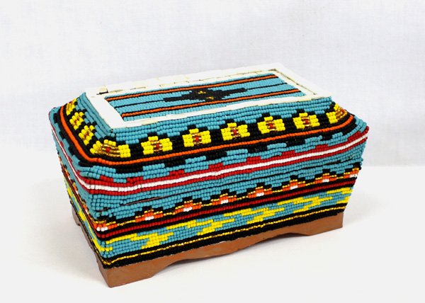 Hand Beaded Hinged Box - Kills Thunder: Hand Beaded Hinged Box - Kills Thunder This Orininal one of a kind box has vivid colors and measures approx. 6''H x 11''W x 6.5''D. Kathleen Kills Thunder was born in Seattle Washington and lives in S