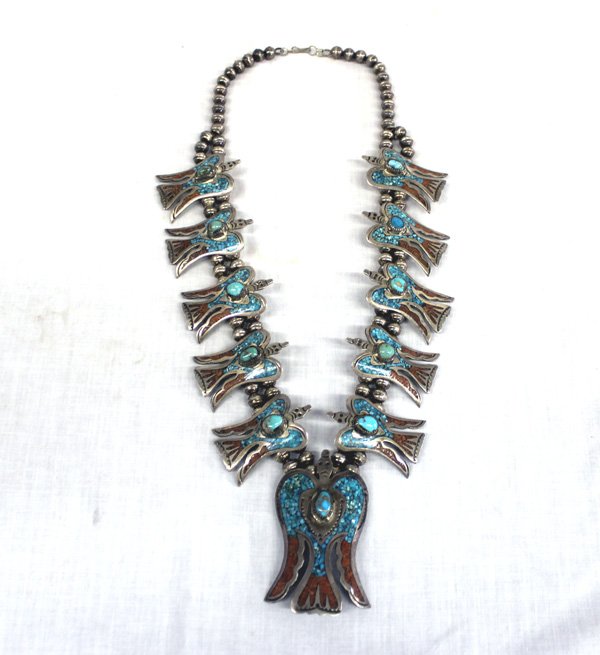 Vintage Navajo Sterling Squash Blossom Necklace - Ben: From the Collection of Nick and Suzanne Nicholas. Vintage 1960-1970s Navajo Sterling Chip Inlay Turquoise and Coral Peyote Bird Squash Blossom Necklace by B. Ben, features 10 peyote bird blossoms each