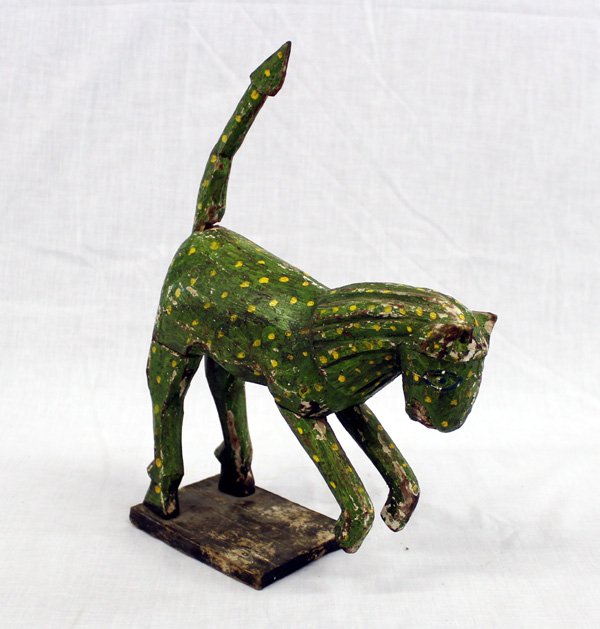 Antique Mexican Wooden Folkart Spotted Leopard: Antique Mexican Wooden Folkart Spotted Leopard, measures 8'' x 12'', handpainted, teeth bared, sage green with yellow spots, on wooden stand
