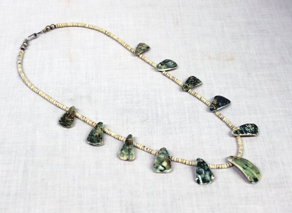 Vintage Santo Domingo Abalone Shell Necklace: Vintage Santo Domingo Abalone Shell and Heishi Necklace, measures 18.5''L, largest shell bead is 1 1/8''L x .5''W, features 11 teardrop shaped abalone beads with shell heishi spacer beads, silver bead