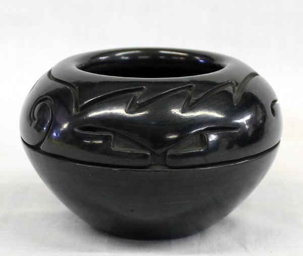 1976 Santa Clara Pueblo Jar by Toni Roller: From the Nick and Suzanne Nicholas Collection we have a Santa Clara Pueblo Jar by Toni Roller, highly burnished, carved geometric and abstract designs, measures 3''H x 4.75''W, signed on bottom by art