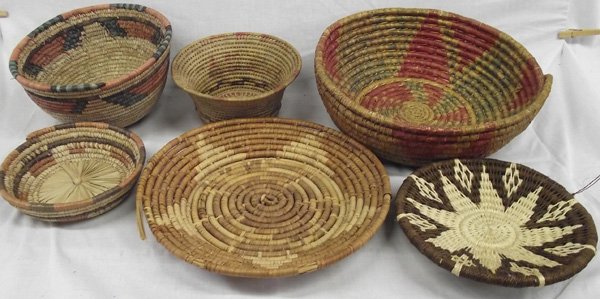 Large Collection of Ethnic Woven Baskets: From the Collection of Nick and Suzanne Nicholas. Collection of 3 Woven Basketry Bowls, largest measures 14.5 in. x 5 in.