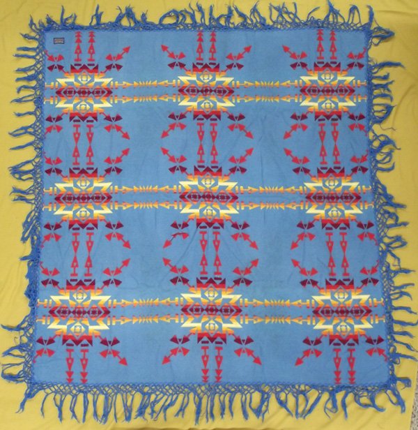 Vintage Pendleton Beaver State Shawl: Vintage Pendleton Beaver State Shawl, measures 72'' x 72'' including fringe, turquoise background and fringe with beautiful sunset hues of Native American geometric shapes, has original Pendleton Beav