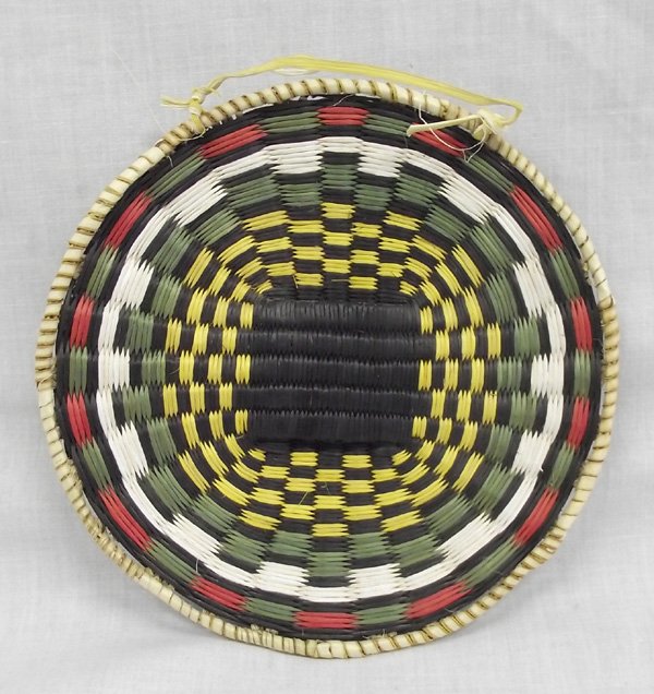 Hopi Woven Tricolored Basket Woven Plaque: From the Collection of Nick and Suzanne Nicholas. Hopi Woven Tricolored Plaque, measures 6.5 in.