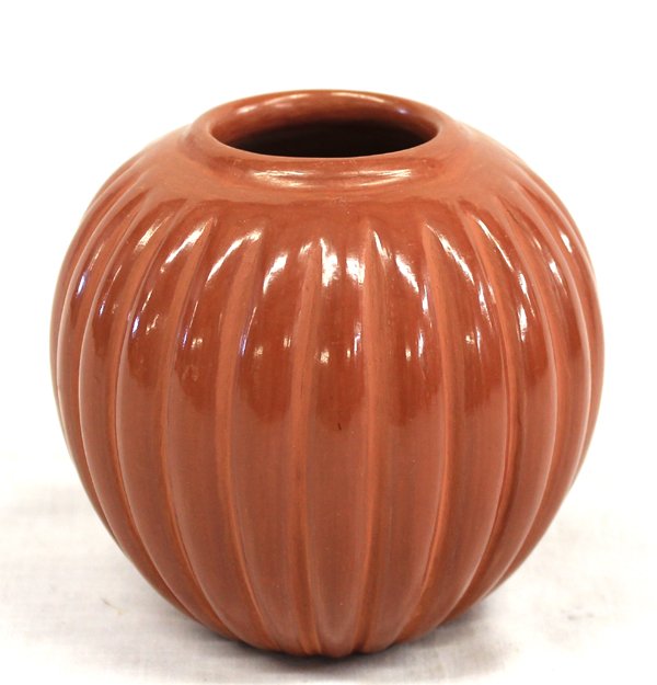Santa Clara Redware Melon Bowl by Alvin Baca: From the Collection of Nick and Suzanne Nicholas we have a Santa Clara Redware Melon Bowl by Alvin Baca, measures 4''H x 4.5''W, signed on bottom by artist, Alvin Baca (Santa Clara) was taught by his