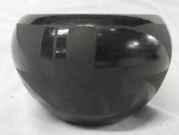 Santa Clara Black on Black Jar by M. Garcia: From the Nick and Suzanne Nicholas Collection we have a Santa Clara Black on Black Jar by Margaret Garcia, measures 3''H x 4.25''W, features geometric designs, signed on bottom Margaret Garcia Santa C