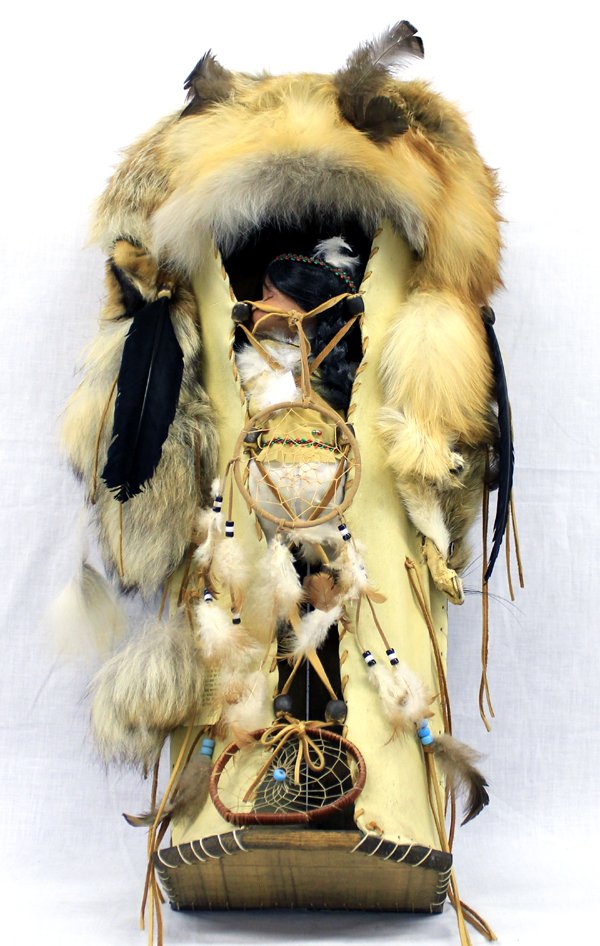 Plains Indian Cradleboard with Doll: Plains Indian Cradleboard with Doll, measures 31'' x 16'', features genuine fur, feathers, leather, beads, embellished with dream catchers, genuine Plains Indian Cradleboard, gorgeous red fox fur, tru