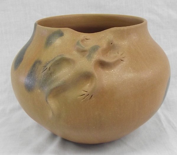 Taos Micaceous Lizard Pottery by Edna Romero: From the Collection of Nick and Suzanne Nicholas. Taos Micaceous Lizard Pottery by Edna Romero, measures 9 in. x 6.25 in., Edna Romero (Santa Clara) is the daughter of famed potter Rose Naranjo. Altho
