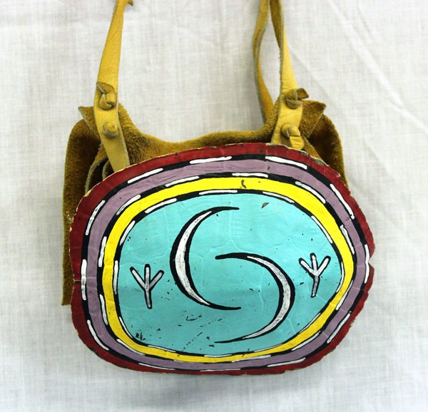 Hopi Handpainted Turtle Shell Leg Rattle: From the Nick and Suzanne Nicholas Collection we have a Hopi Handpainted Turtle Shell Leg Rattle, shell measures 6.5''L x 5.5''W, leather wrap is 4''H X 6''W, shell is vibrantly painted turquoise, bla