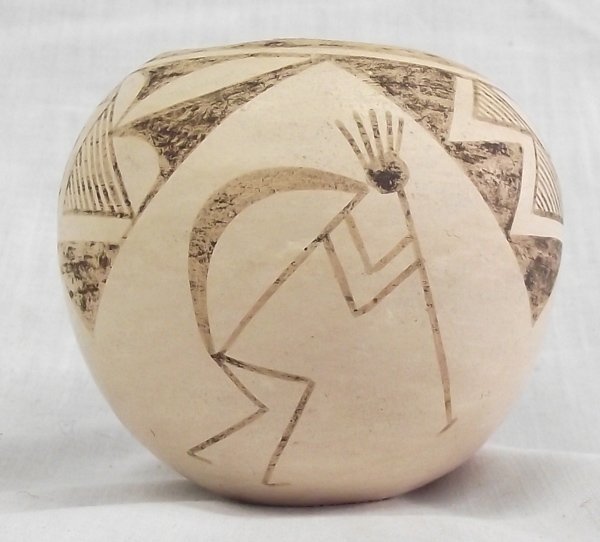 Vintage Acoma Humpback Kokopelli Jar by Lucy Lewis: From the Nick and Suzanne Nicholas Collection we have a Vintage Acoma Humpback Kokopelli Jar by Lucy M. Lewis, measures 2.25''H 3.25''W, features geometric shapes and lines, signed on bottom Lucy M. L