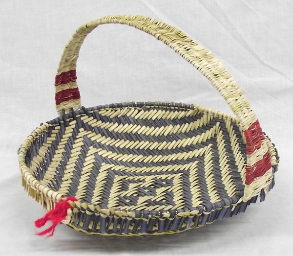 Hopi Tricolored Sifter Basket with Handle: From the Collection of Nick and Suzanne Nicholas. Hopi Tricolored Sifter Basket with Handle, measures 12 in. x 2.75 in.