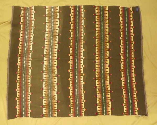 Antique Pendleton Blanket: Antique Pendleton Blanket, measures 50'' x 62'', ribbon selvage wear, beautiful southwestern desert colors of Native American geometric designs, has original Pendleton Beaver State tag. Shows fading,