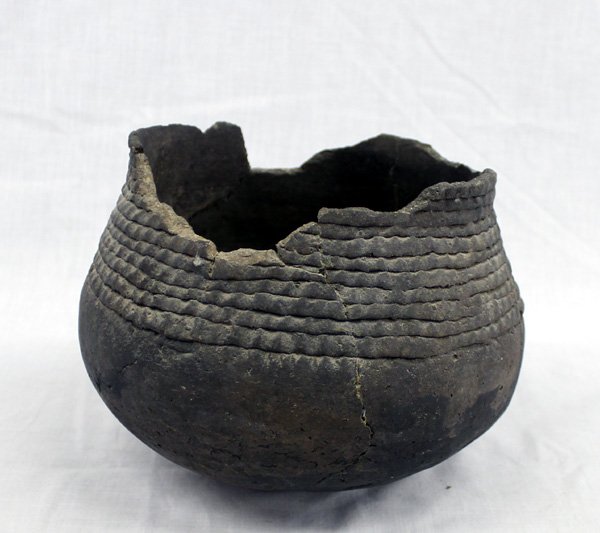 Prehistoric Mimbres Utilitarian Jar: From the Bill Freeman (deceased) New Mexican Estate, Prehistoric Mimbres Utilitarian Jar, measures 7''H x 7''D, corrugated style, has been glued and has 10% restoration, missing top rim of jar