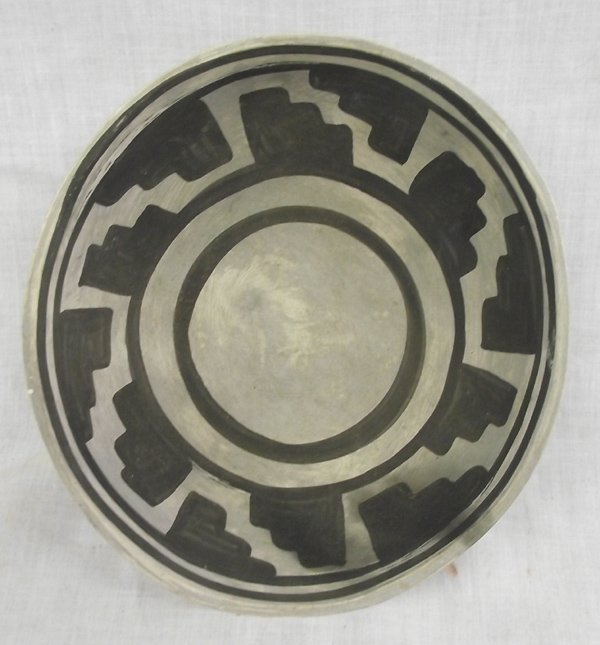 Anasazi Reproduction Black on White Bowl: From the Bill Freeman (deceased) New Mexico Estate, Anasazi Reproduction Black on White Bowl, measures 3''H x 6.5''W, features black stairstep cloud designs on white bowl, black circle in bottom of bo