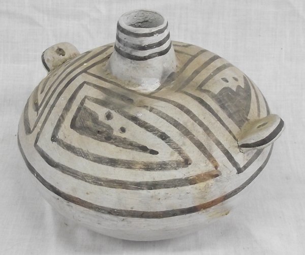 Anasazi Reproduction Black on White Olla: From the Bill Freeman (deceased) New Mexico Estate, Anasazi Reproduction Black on White Olla, measures 6''H x 7''D, features black maze style designs, stairstep cloud designs, and lines on white olla,