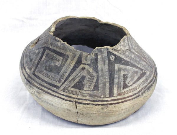 Classic Mimbres Black on White Olla Pottery: Classic Mimbres Black on White Olla Pottery, from Sherman Estate, Silver City, NM. Olla measures 8'' x 14''D, missing top and bottom, features traditional geometric lines and designs, has been glued o
