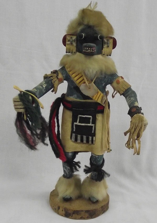 Navajo Blue Ahote Kachina: From the collection of Nick & Suzanne Nicholas. Navajo Blue Ahote Kachina, measures 6''w x 10.5''h. Heavily decorated and exceptional workmanship, holding a wish bone!