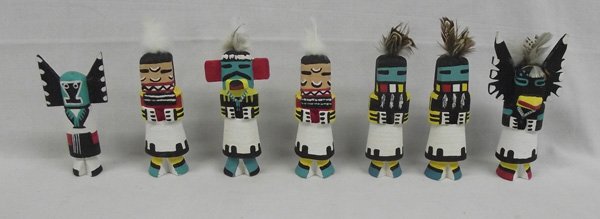 Zuni Hand Carved Route 66 Kachinas by Leroy Pooley: Zuni Hand Carved Route 66 Kachinas by Leroy Pooley, largest measures 5''H x 2.5''W, all signed on bottom by artist, #1 Crow by Pooley hand painted and adorned with feathers #2 Mother by Pooley ''Hopi'