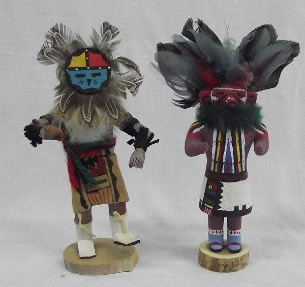 Two Hopi Dancer Kachinas: From the collection of Nick & Suzanne Nicholas. Two Hopi Dancer Kachinas, both measuring 6.5''h x 5.5''w. The sunface kachina is signed ''SW Alonzo''.
