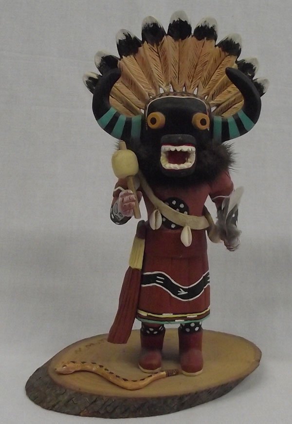 1982 Hopi Snake Dancer Kachina by N. Muth: From the collection of Nick & Suzanne Nicholas. 1982 Hopi Snake Dancer Kachina by N. Muth, measures 10''h x 6.5''w., inscribed ''N. Muth'' on the base and signed on the bottom, ''Snake Dancer 1982''. 
