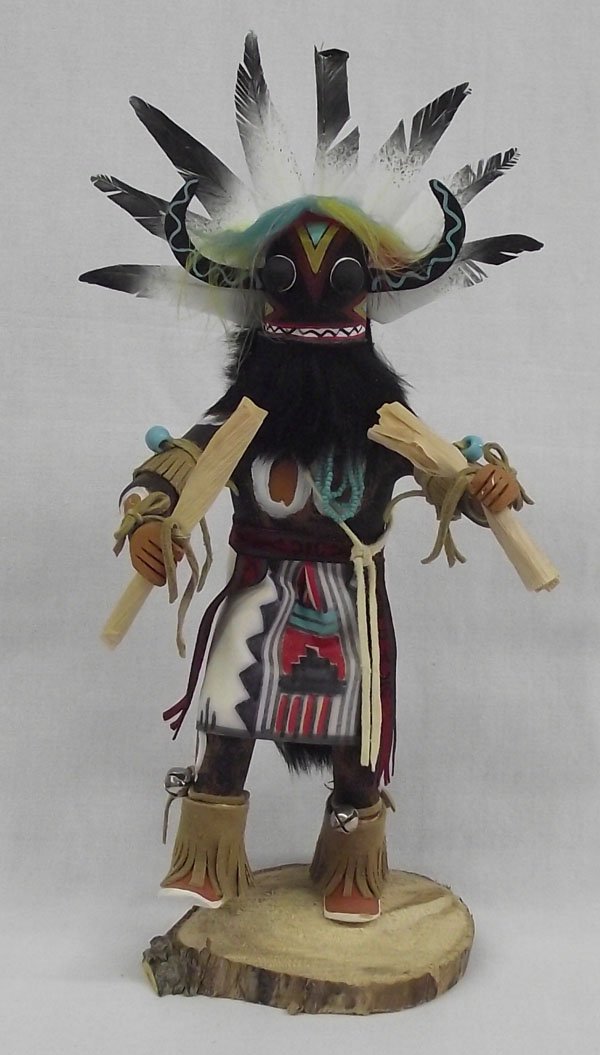 2004 Navajo Broad Face Kachina: From the Nick and Suzanne Nicholas Collection, 2004 Navajo Broad Face Kachina, measures 12.25''H x 5.5''W which includes feathers, beautifully carved and hand painted, embellished with black rabbit fu