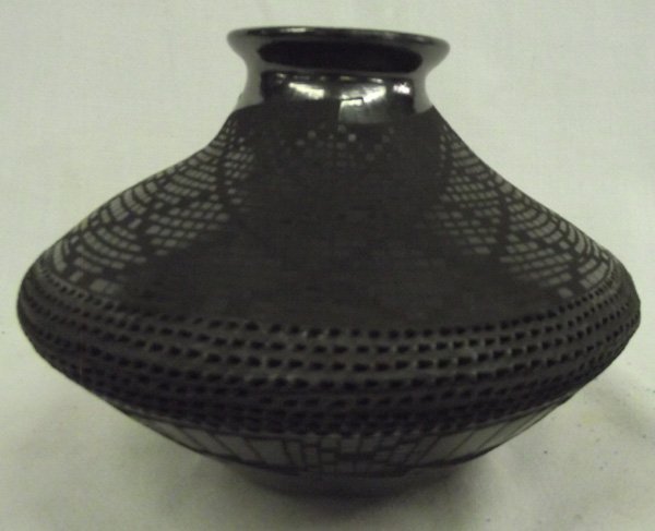 Mata Ortiz Burnished Black on Black Olla - Soto: Mata Ortiz Highly Burnished Black on Black Olla by Benjamin Soto, eye dazzling checkerboard designs, textured mid section, and geometric accents on top and bottom. Gun metal finish and pulled spout. M