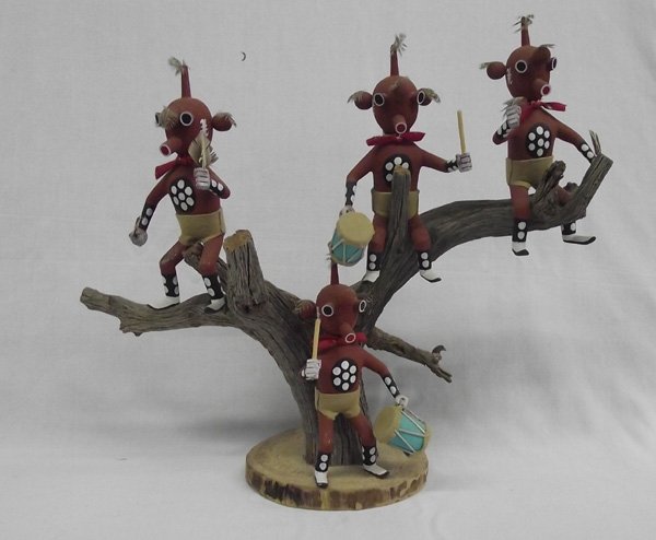 Tree of Hopi Mudhead Kachinas: From the collection of Nick & Suzanne Nicholas. Tree of Hopi Mudhead Kachinas, 4 individual mudhead kachinas displayed on a weathered tree branch on a traditional cottonwood base. Bright and colorful 