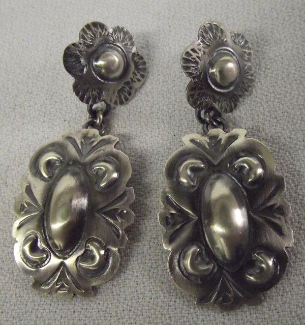 Navajo Revival Sterling Earrings by Tim Yazzie: Navajo Revival Sterling Earrings by Tim Yazzie, measures 1 7/8''L, beautifully hand stamped earrings