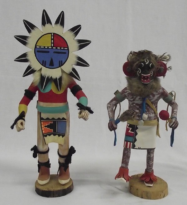 Navajo Kachinas by E. Calvin and A.D. Morris: From the Nick and Suzanne Collection we have Navajo Kachinas by E. Calvin and A.D. Morris, #1 ''Sun'' by E. Calvin measures 12.5''H x 5''W, beautifully painted and carved, yarn knee, arm, and wristban
