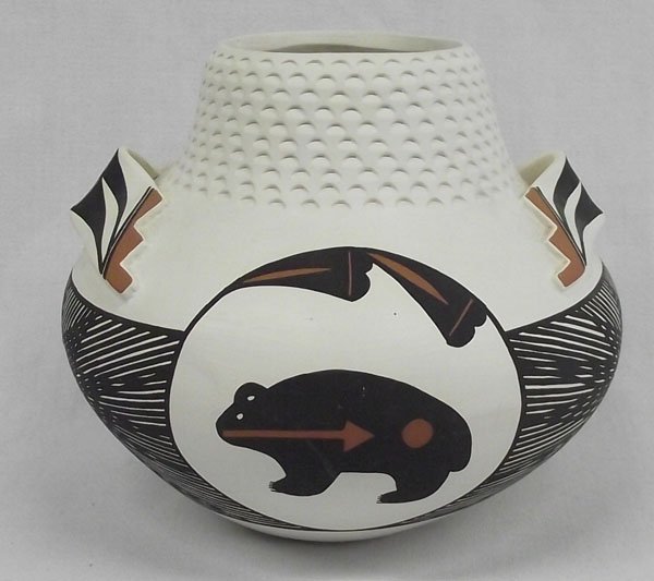Acoma Eye Dazzler Pottery Jar by Garcia: From the Nick and Suzanne Nicholas Collection we have a stunning Acoma Pottery Jar by Garcia, measures 6.5''H x 7.5''W, very unique bear and fine line design, stylized stairstep handles, highly textur