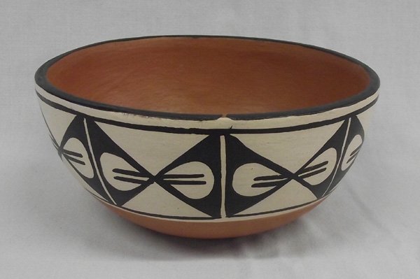 Santo Domingo Chile Bowl by Anna Marie Lovato: From the Nick and Suzanne Nicholas Collection we have a Santo Domingo Chile Bowl by Anna Marie Lovato well known artist, measures 3.5''H x 8.25''W. She is best known for this type of bowl and her work