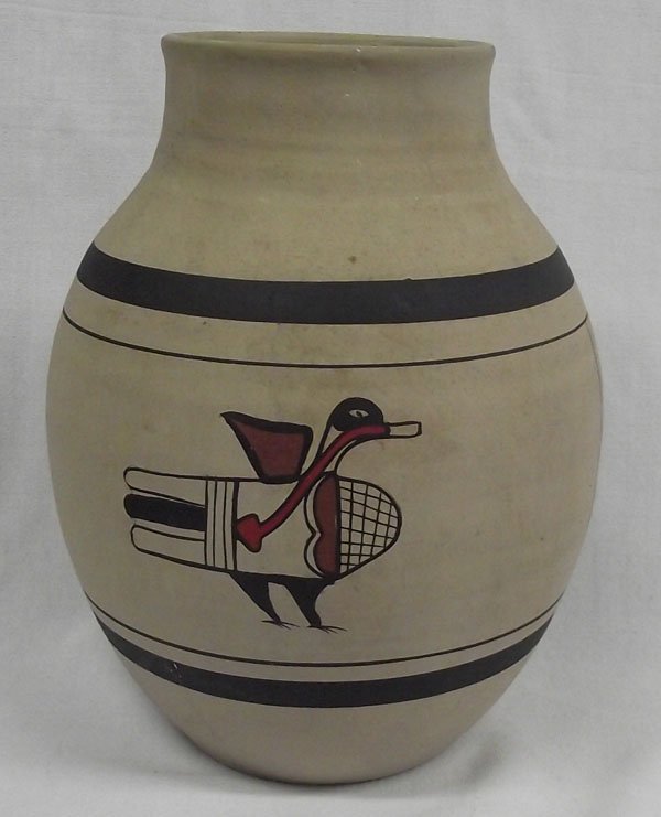 Zuni Polychrome Jar, Unsigned: From the collection of Nick & Suzanne Nicholas. Zuni Polychrome Jar, Unsigned, measuring 8.5''h x 7.5''w. Very stylized designwork with duck fetishes on either side, beautiful work!