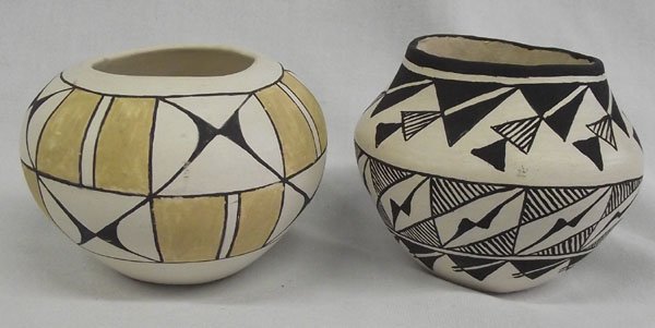 Two Acoma Pots, Signed ''JSP'', One Unsigned: From the collection of Nick & Suzanne Nicholas. Two Acoma Pots, one signed ''JSP''. Cream and black decorated Acoma pot, measuring 3.5''h x 4.5'' wide. Second pot is polychrome cream, black and mustar