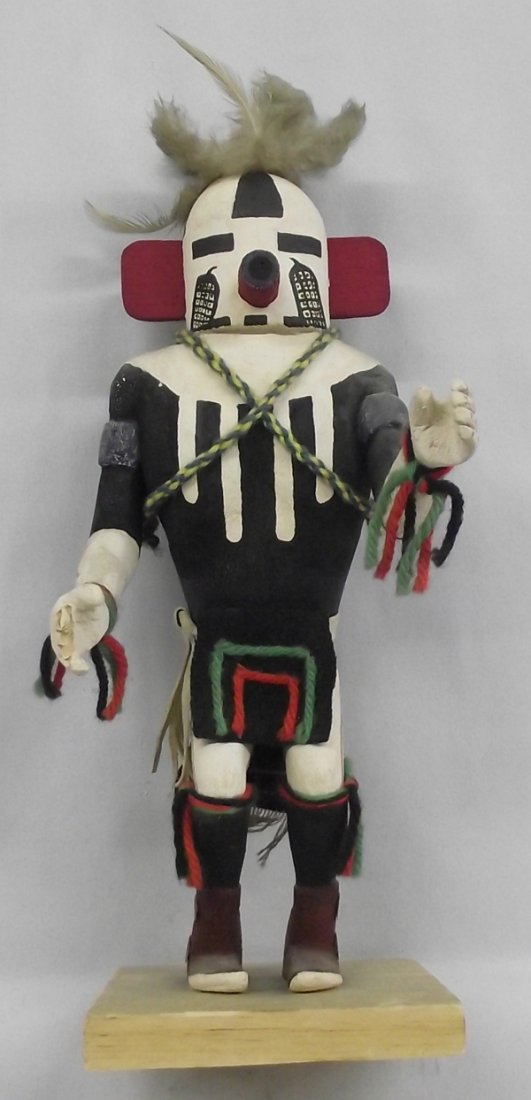 Vintage Navajo Kachina: Vintage Navajo Kachina, the Plant kachinum basicly aid food production and bring rain. Their are several of them, but most of them do the same tasks, measures 14''H x 5''W, kachina is wearing a felt a