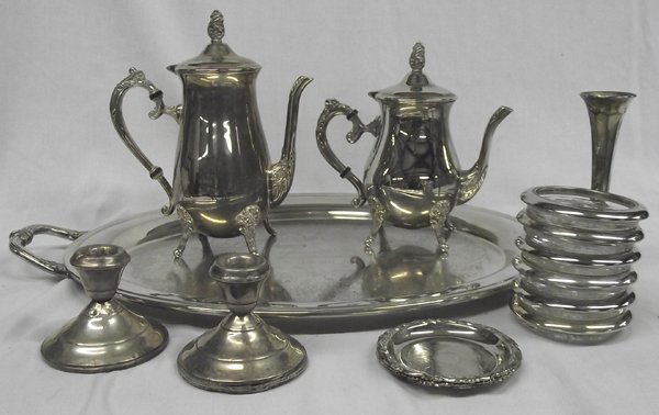 Vintage Silver Plate Coffee and Tea Service Plus: From the Proctor Collection. Vintage Silver Plate Coffee and Tea Service Plus. These are varying pieces and include a coffee and tea pot, 6 glass and silverplate coasters. 3 Silverplate coasters, a pr