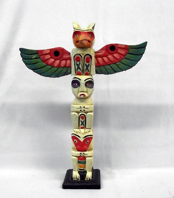 Northwest Coast Wooden Totem Pole: Northwest Coast Wooden Totem Pole, measures 16.5''H x 13''W, hand carved and very colorful