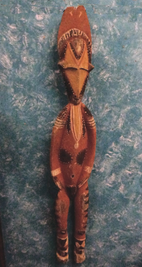 African Carved and Handpainted Wooden Figure: African Carved and Handpainted Primitive Wooden Female wall art. Old aged African paint. Stands 53''H x 9.5'' W. From Proctor Collection, Silver City, New Mexico. Unless noted, all items are of accept
