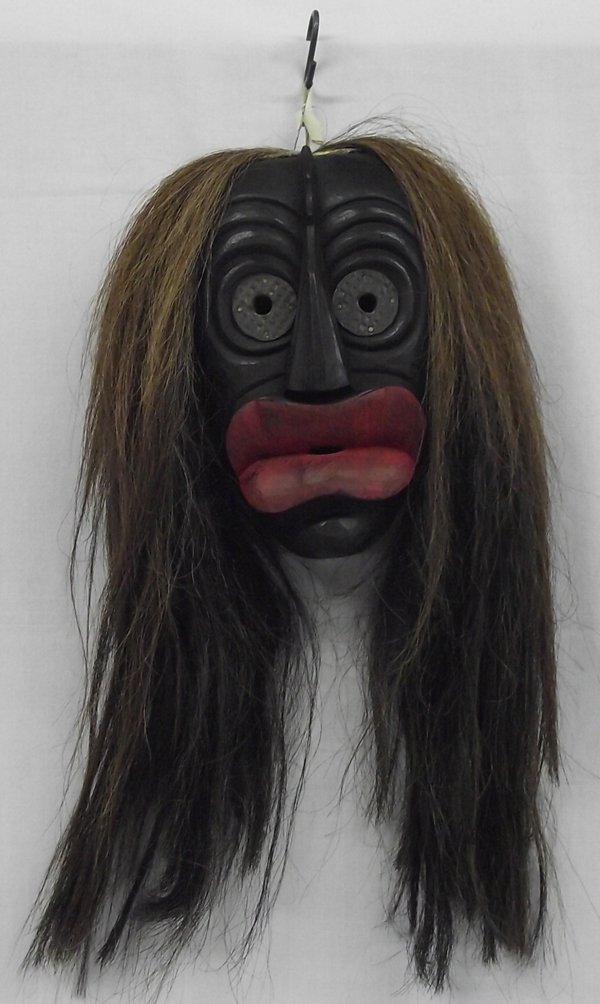 Oneida False Face Iroquois Mask by Chrisjohn 1921-1991: Oneida False Face Iroquois Hand carved Mask by Master Carver Richard "Dick" Chrisjohn, Sr. Measures approx. 9''L x 6''W. Richard “Dick” Chrisjohn (Wolf Clan), the former Nation representative whos
