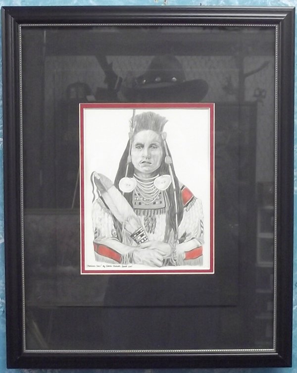 Original Art Titled ''Medicine Crow'' by D.M. Smith: From the Collection of Nick & Suzanne Nicholas. This Stunning Pencil drawing of a Native American by Dawne Michelle Smith and dated 2011 is Framed, matted and under glass. It has a visual measurement