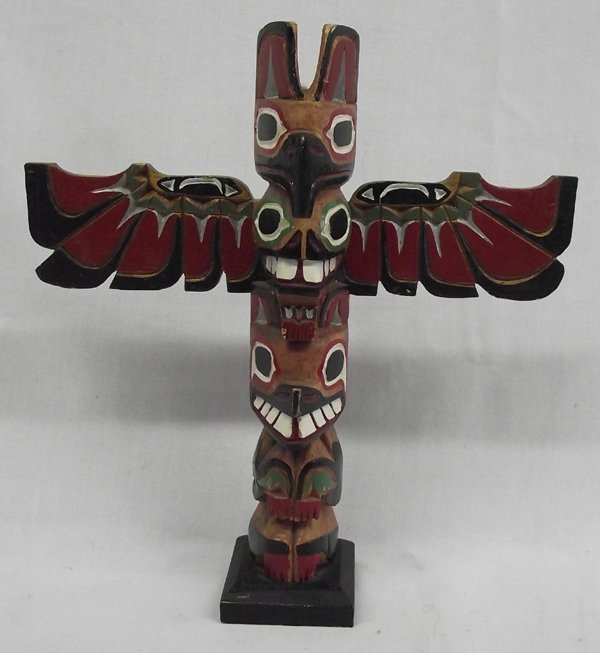 Northwest Native American Totem Pole.: Northwest Native American Totem Pole. This wonderful piece with it's vibrant colors measures appro. 13''H x 12.5''W
