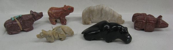 Collection of Zuni Hand Carved Fetishes: Collection of Zuni Hand Carved Fetishes, #1 Jet Panther signed Justin R. (Red Elk), turquoise eyes and measures 7/8''H x 2.25''L #2 Soapstone Bear with turquoise arrowhead powerpack and eyes, measures