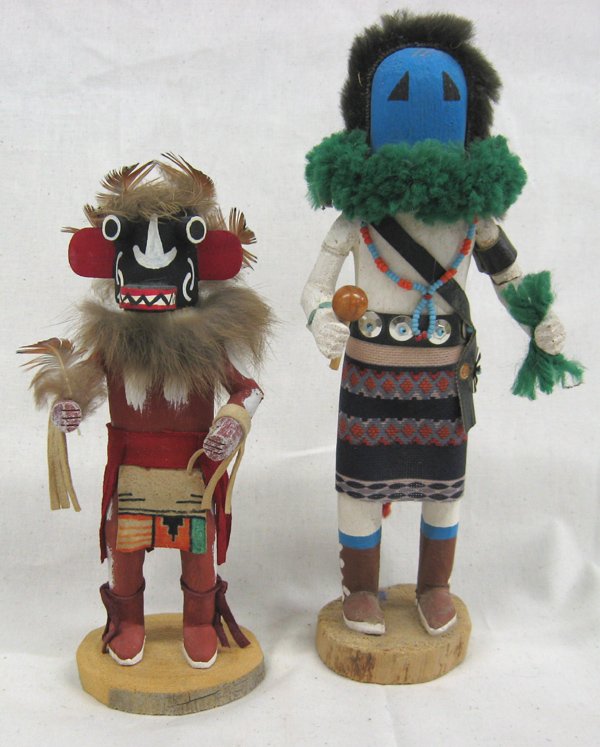 Navajo Hand Carved Kachinas by Mitchell & Bia: Navajo Hand Carved Kachinas by L. Mitchell & Elaine Bia, #1 Chaveyo Ogre signed on bottom by artist L. Mitchell and is hand painted and embellished with feathers and rabbit fur #2 Yei Bei Chei signed