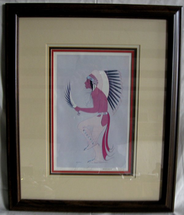 Creek Signed and Numbered Solomon McCombs Print: From the Collection of Nick & Suzanne Nicholas we have this Signed and Numbered Solomon McCombs Print. Titled ''Indian Dancer'' and numbered 1/500 this Framed and matted piece has a visual measurement