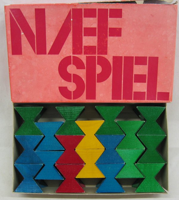Vintage Naef Spiel Swiss Building Bricks Game: From the Proctor Collection. Vintage Naef Spiel Swiss Building Bricks Game is one of the first designs by company founder Kurt Naef. Has the stamp ''Swiss made Neaf Spiel''. Each of the eighteen brick
