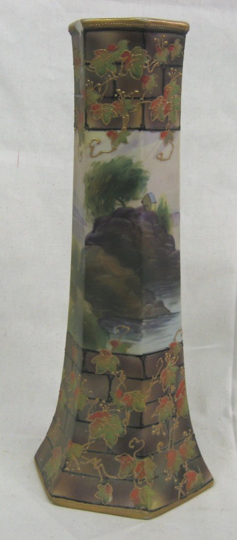 Vintage Nippon Hand-Painted Vase: Vintage Nippon Hand-Painted Vase. Beautiful idyllic scene hand-painted around the middle of the six-sided vase. Above and below are vines against brick walls, all outlined in gold moriage work. The vi