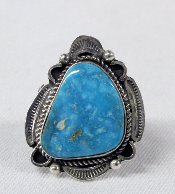 Navajo Sterling & Blue Ridge Turquoise Ring - Tom: Navajo Sterling & Blue Ridge Turquoise Ring by artist R Tom. Polished Blue Ridge Turquoise cabochon sets this ring apart with traditional Navajo silverwork surrounding the stone. It is stamped ''R.Tom