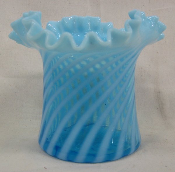 Fenton Blue Opalescent Swirl Ruffled Vase: From the Proctor Collection. Fenton Blue Opalescent Swirl or spiral optic ruffled vase, measuring 4'' x 5''.