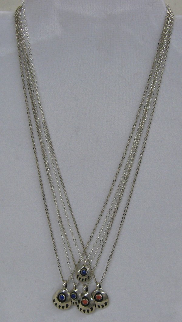 5 Navajo Sterling Bear Claw Necklaces: Navajo Sterling Bear Claw Necklaces-5 Pieces. All have 18'' sterling chains with pendants with 3 lapis stones and 2 coral stones, set in a shadow-box style. The largest pendant measures 1'' with bail.