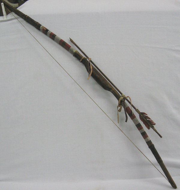 Sioux Beaded Bow and Arrow: From the Van Yaryan Collection, Silver City, NM we have a Sioux Beaded Bow and Arrow. Bow measures 45''L
